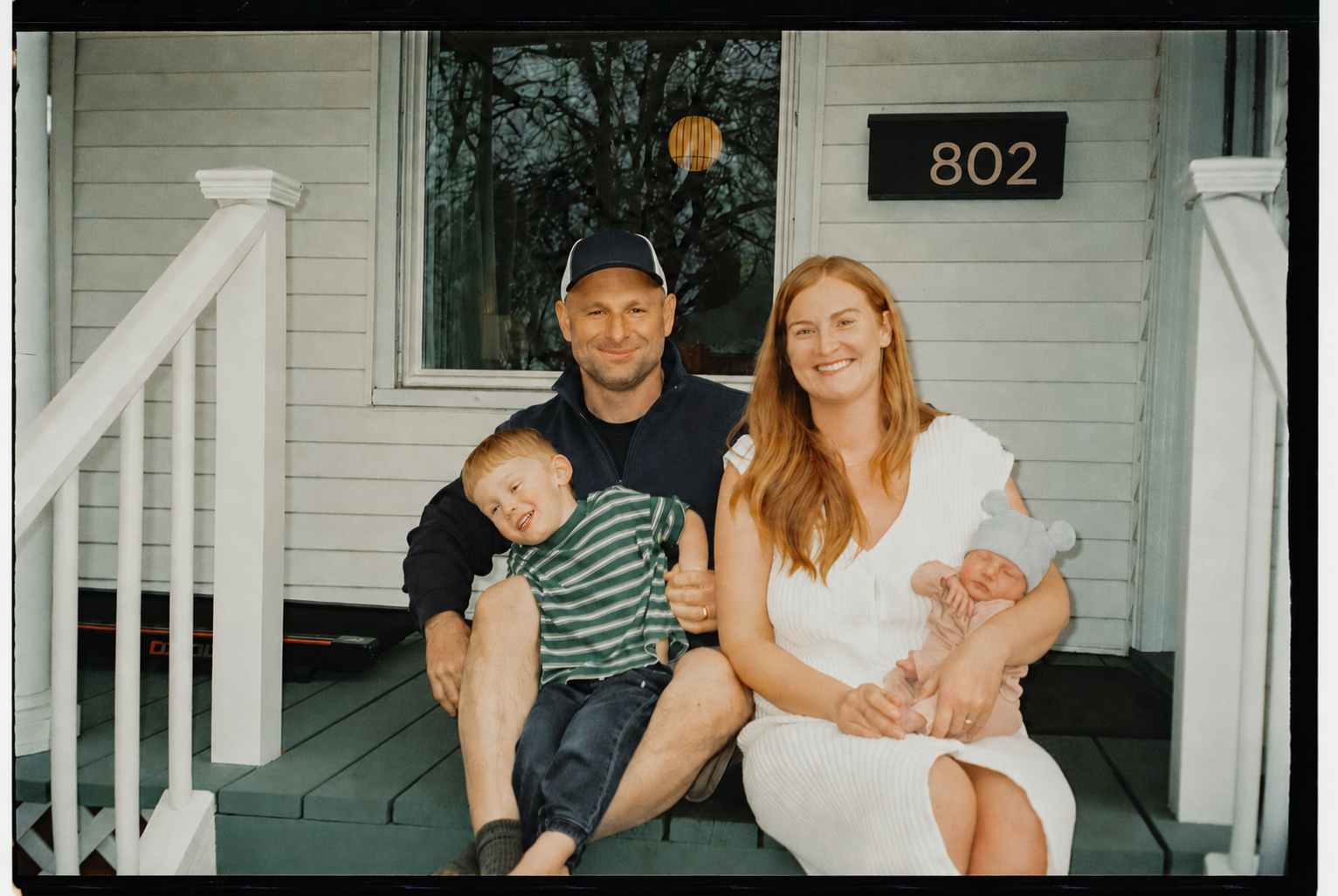 Brian Haller with his family on the front porch